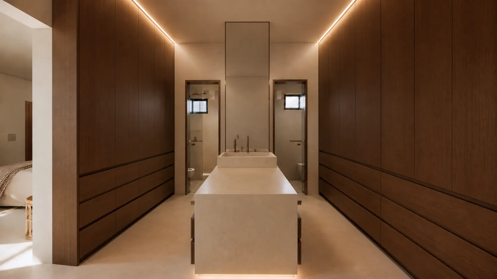 Vestidor de Casa Rodbal con luz lineal perimetral, isla de piedra y acceso a la recámara